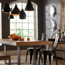 Industrial Dining Room by Zin Home
