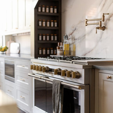 Painted Inset Cabinetry and Leathered Granite in a Transitional Edmond Kitchen