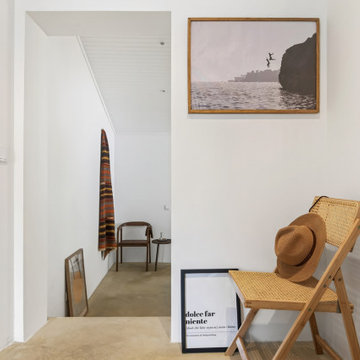 Entry Detail with Cane Chair and Framed Artwork
