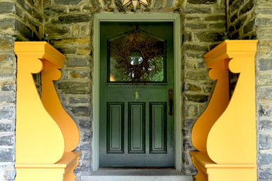 Example of a classic entryway design in Philadelphia with a black front door