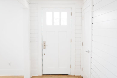 Example of a transitional entryway design in Other
