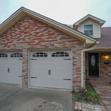 Reversed Garage Conversion with Carriage House Doors
