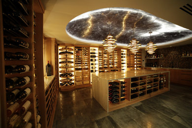 Large eclectic wine cellar photo in Oklahoma City