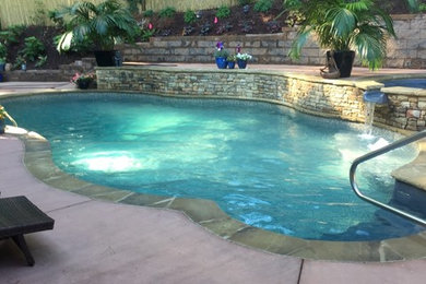 Pool - mid-sized contemporary indoor stone and custom-shaped pool idea in Atlanta