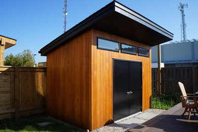 Mid-sized minimalist backyard deck photo in Other