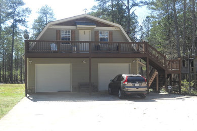 Large transitional brown two-story exterior home photo in Atlanta
