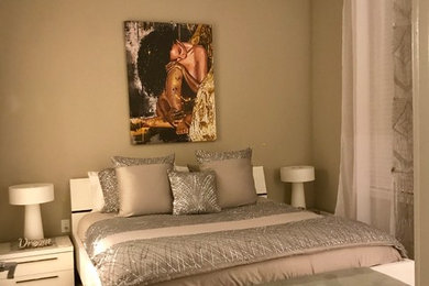 Example of a minimalist bedroom design in Atlanta
