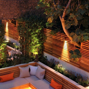 Urban West London Garden uses Contemporary Slatted Screen Fencing