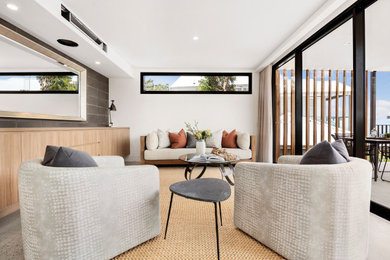 Photo of a beach style family room in Sydney.