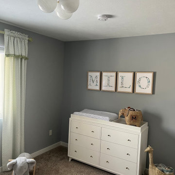 Nursery with custom lettering and framing