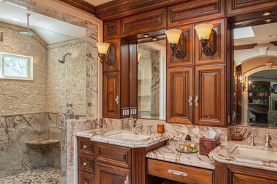 Example of a large mid-century modern master bathroom design in Los Angeles with raised-panel cabinets