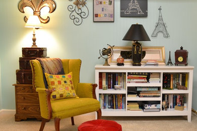 Example of a mid-sized classic enclosed carpeted and beige floor living room library design in Other with blue walls, no fireplace and no tv