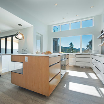 Uniquely designed island with open shelving.