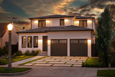 Design ideas for a transitional two-storey white exterior in Los Angeles.
