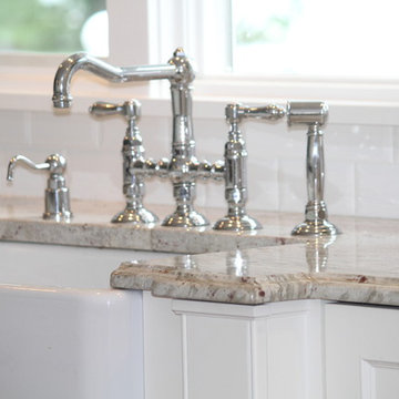 Granite, Marble and More Granite in Stunning Lakefront Cottage Style Home