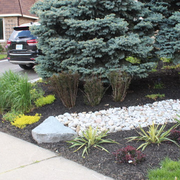Front yard with no lawn and a lot of curb appeal
