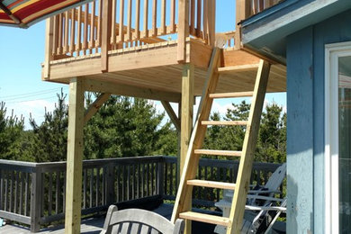 Deck - mid-sized coastal backyard deck idea in New York with no cover