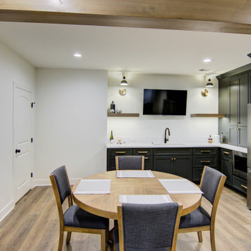 Warm & Inviting Basement Retreat with Kitchenette and Reading Nook
