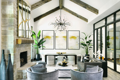Example of a transitional light wood floor living room design in Houston