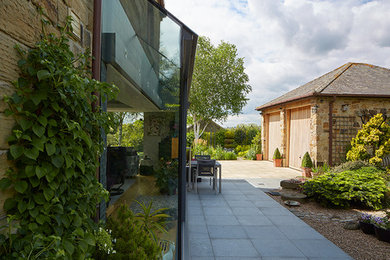 Photo of a large contemporary house exterior in Other.
