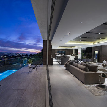 Los Tilos Hollywood Hills luxury home opens sliding glass pocket walls bringing