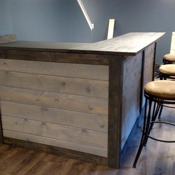 Rustic weathered basement bar.