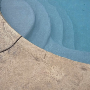 Custom Freeform style salt water pool with waterfall