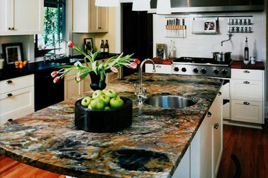 Trendy eat-in kitchen photo in San Diego with white cabinets, white backsplash, subway tile backsplash, colored appliances and an island