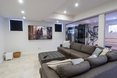 Inspiration for a mid-sized transitional look-out porcelain tile basement remodel in Edmonton with white walls