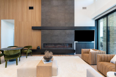 Living room - modern formal and open concept brown floor living room idea in Phoenix with a standard fireplace, a tile fireplace and no tv