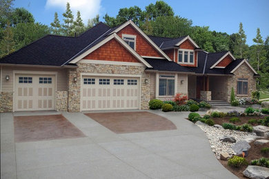 Inspiration for a mid-sized rustic brown two-story mixed siding exterior home remodel in Seattle with a shingle roof