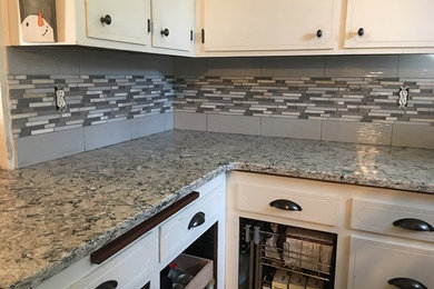 Example of a classic kitchen design in Other