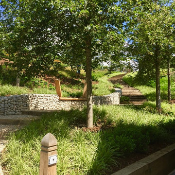 Large garden on a sloping site for a substantial new build property