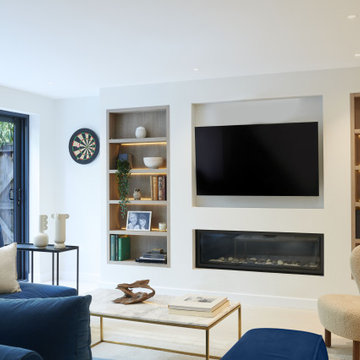 Modern living room with bespoke joinery and recessed TV