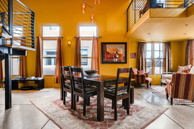 Example of a minimalist dining room design in Albuquerque