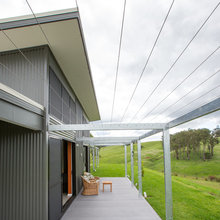 Outside open doors and concrete facade
