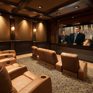 Large elegant enclosed home theater photo in Santa Barbara with a projector screen
