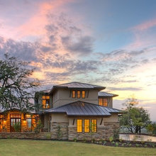 hill country/craftsman w modern/clean lines low pitched roof and warmth