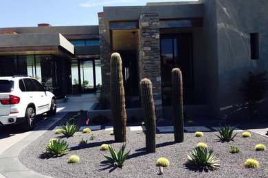 Mid-sized modern gray one-story stucco exterior home idea in Phoenix