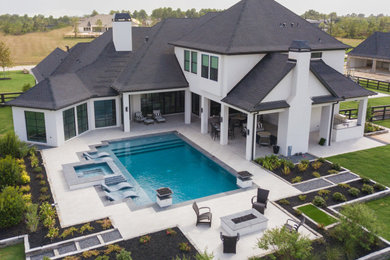 Home design - large transitional home design idea in Houston