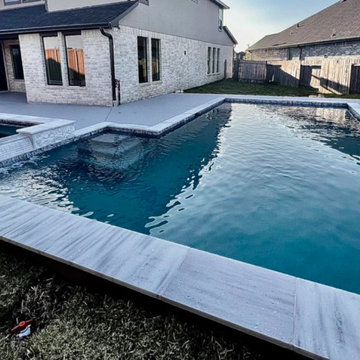 Geometric Pool with Raised Spa and Travertine Coping