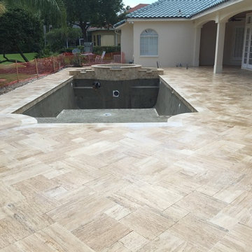 Complete Renovation adding a spa and Sunshelf,kitchen,vein cut Ivory Travertine