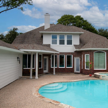 Re-side and gutters of mid-90's 2 story house in Houston, TX