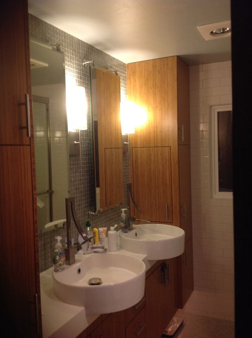 What art should I hang above toilet in Mid century modern bathroom?