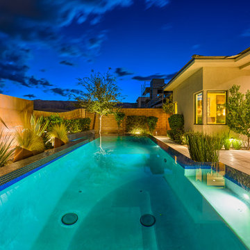 Raised Rim Flow Pool with Custom Fire/Water Feature