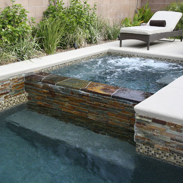 Glass tile projects -Mosaic earth tone 1” X 1” glass tile was utilized on the wa
