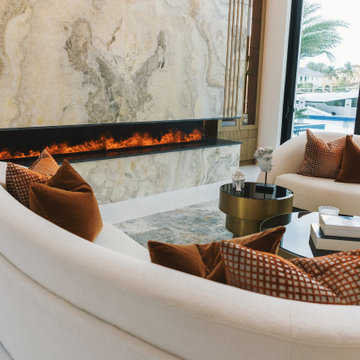 Modern Comfort: Curved Sofas with Multilevel Cocktail Table