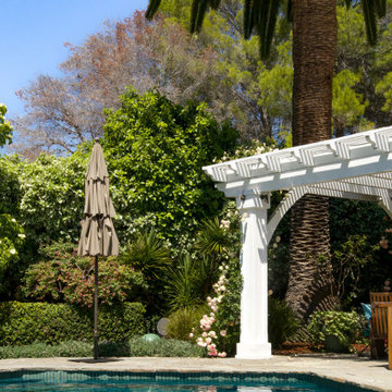 White Pergola Beside the Pool Terrace