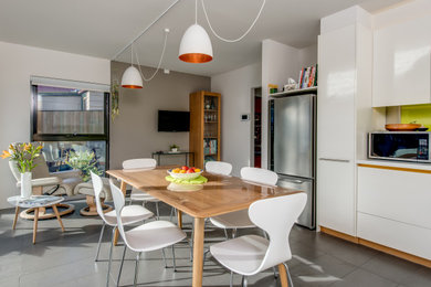 Contemporary kitchen/dining combo in Hobart.