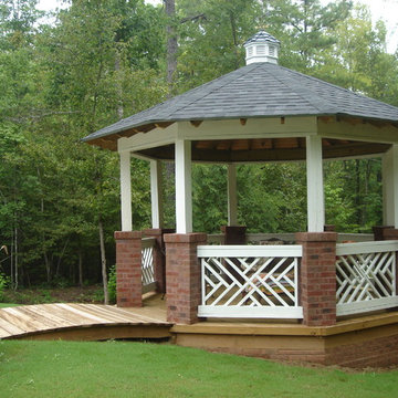 Macon GA detached Gazebo with brick pillars and white Chippendale railing
